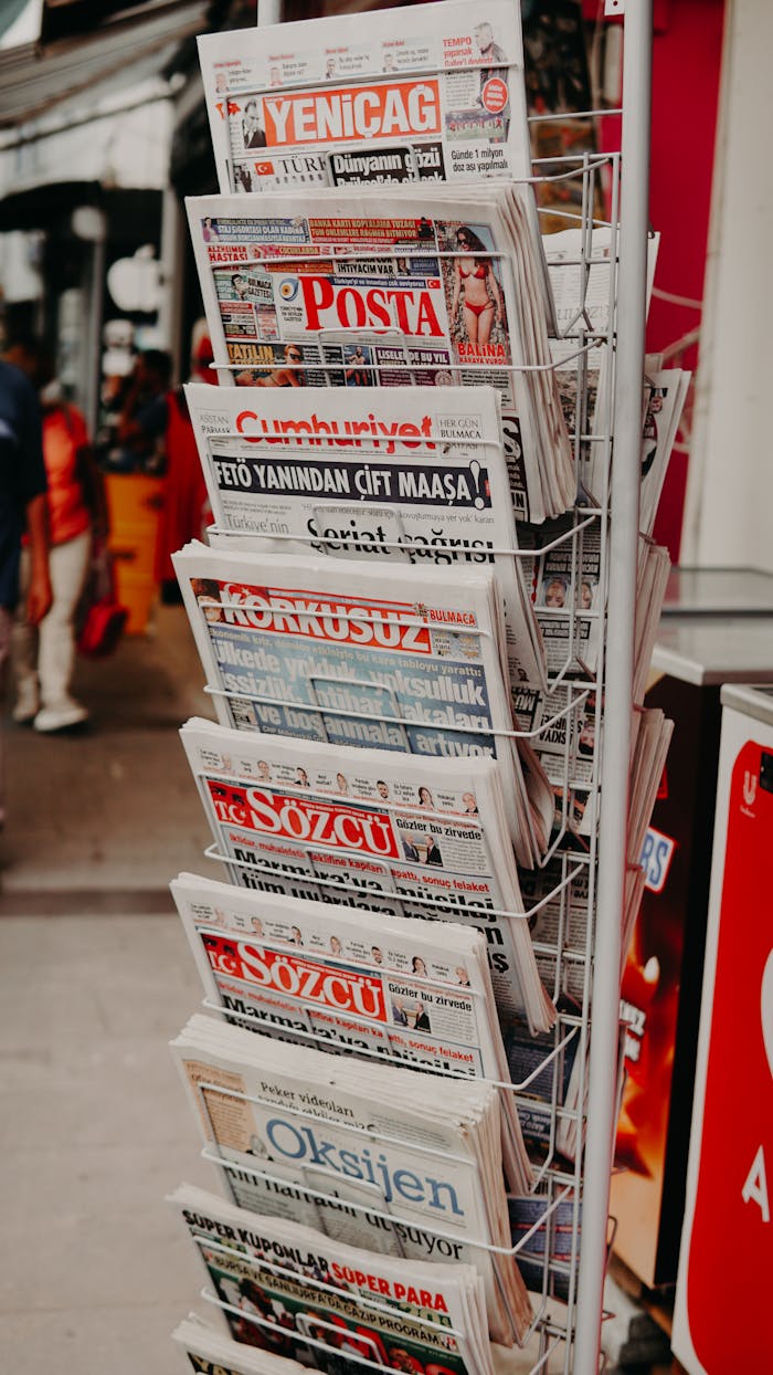 portfolio-03 Close-up of various Turkish newspapers on a street stand, capturing daily life.